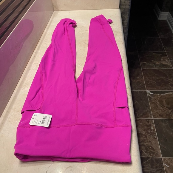 Free people movement wave rider leggings has pockets. Magenta size xs - Picture 5 of 11